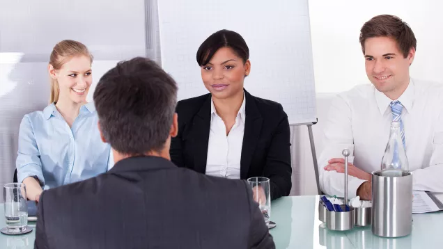 Businesspeople In An Interview